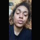 A black girl records herself shitting into a toilet featuring poop action from a rear perspective Presented in 720P vertical HD format. About half a minute.
